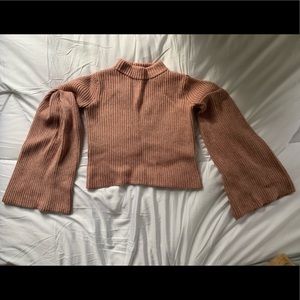 Cropped endless rose sweater with bell sleeves